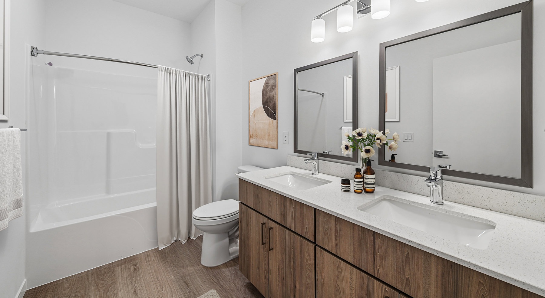 bath with double vanities and mirrors