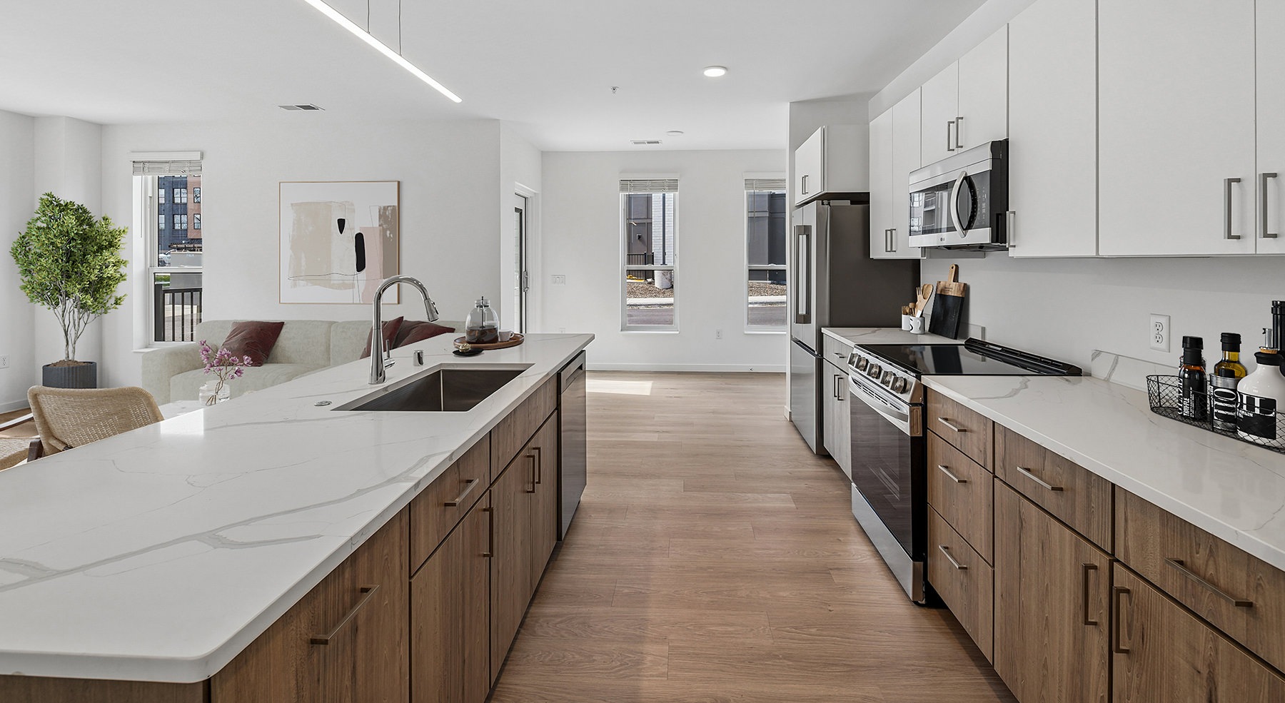 kitchen with white cabinets and quartz countertops