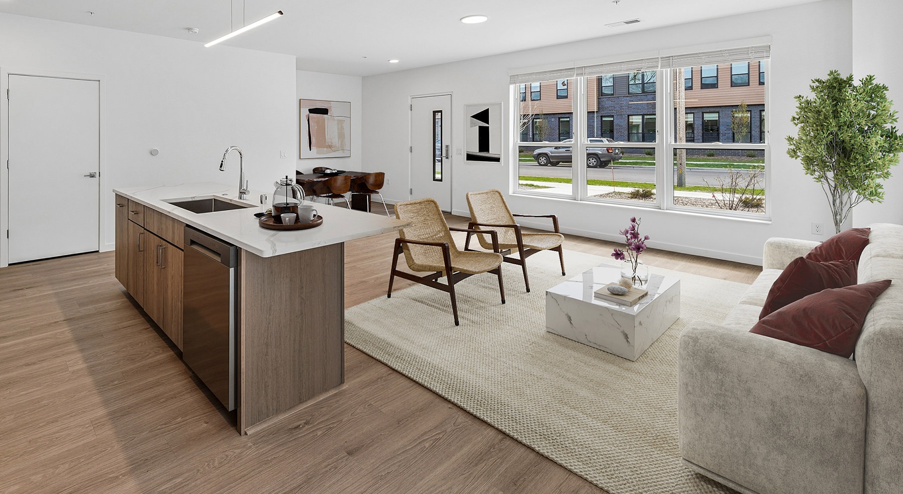 living room with kitchen island couch and chairs